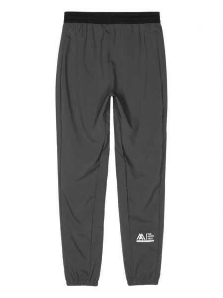 Sportovní kalhoty s potiskem The North Face šedé