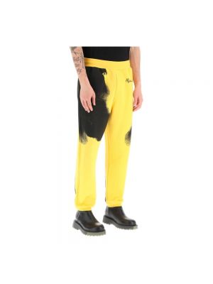 Pantalones de chándal con estampado Moschino amarillo