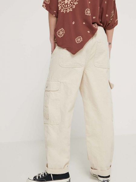Jednobarevné bavlněné kalhoty s vysokým pasem Vans béžové