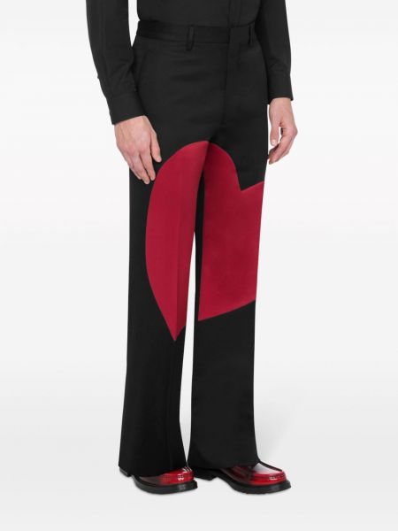 Pantalon à imprimé de motif coeur Moschino