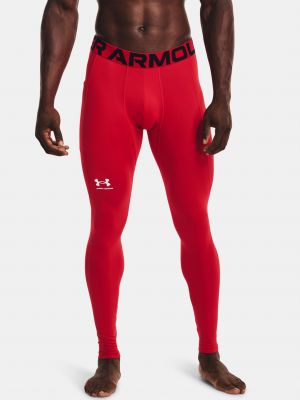 Teplákové nohavice Under Armour červená