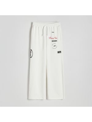 Teplákové nohavice s potlačou Reserved biela