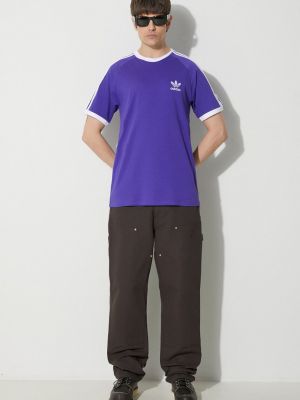 Koszulka bawełniana w paski Adidas Originals fioletowa