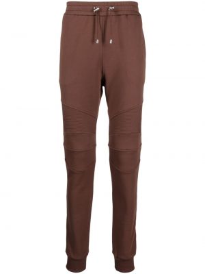 Pantaloni con stampa Balmain marrone