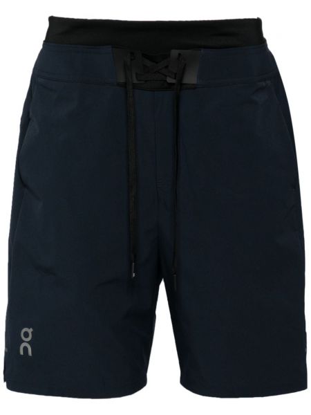 Läuft shorts mit print On Running blau