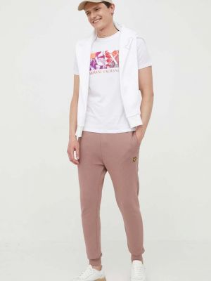 Однотонні бавовняні спортивні штани Lyle & Scott рожеві