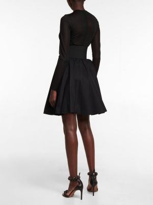 Bavlnená midi sukňa Alaã¯a čierna