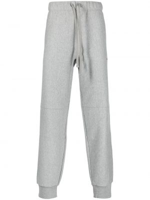 Bavlněné sportovní kalhoty s výšivkou Carhartt Wip šedé
