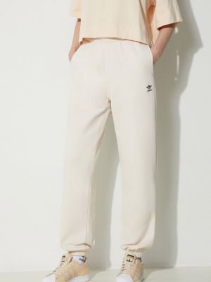 Бежевые флисовые спортивные штаны с аппликацией Adidas Originals