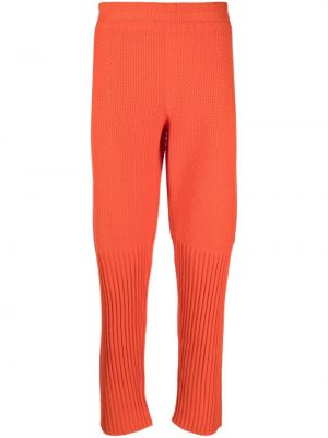 Pantaloni in maglia Homme Plissé Issey Miyake arancione