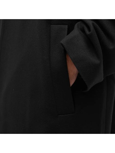 Шерстяное пальто Studio Nicholson черное