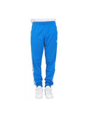 Spodnie sportowe w paski Adidas Originals niebieskie