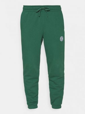 Спортивные штаны New Balance зеленые