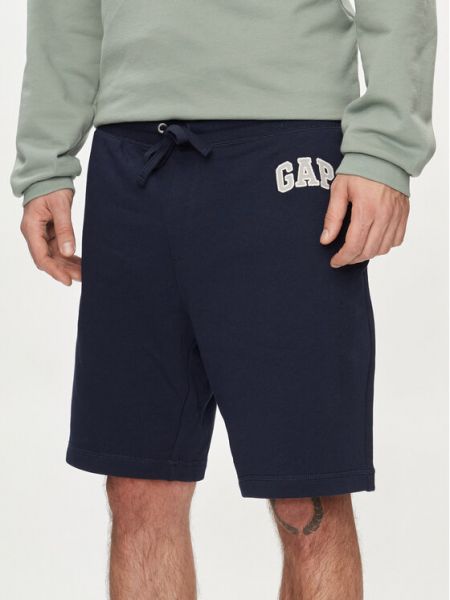 Priliehavé športové šortky Gap modrá