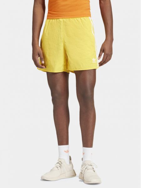 Športové priliehavé šortky Adidas žltá