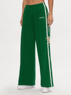 Priliehavé teplákové nohavice Guess zelená