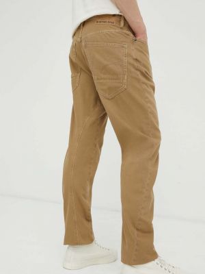 Jednobarevné bavlněné kalhoty s hvězdami G-star Raw béžové