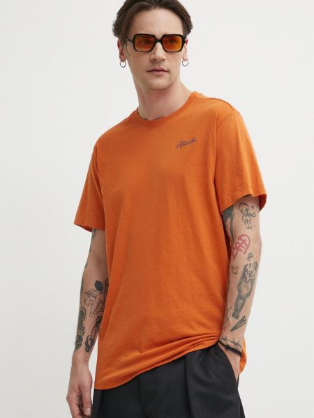 Koszulka bawełniana z nadrukiem w gwiazdy G-star Raw pomarańczowa