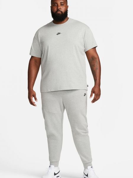 Хлопковое поло свободного кроя для фитнеса Nike серое