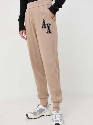 Спортивные штаны с аппликацией Armani Exchange бежевые