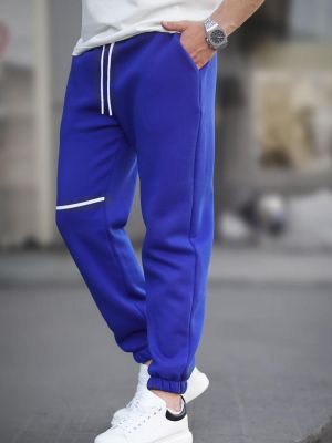 Spodnie sportowe z kieszeniami Madmext niebieskie