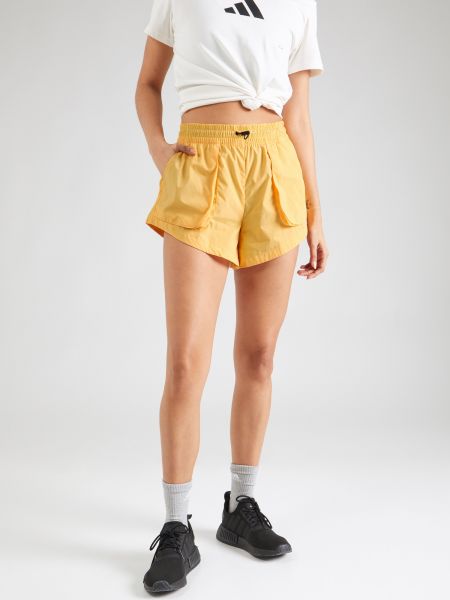 Hlače bootcut Adidas Sportswear žuta