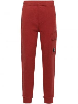 Bavlnené teplákové nohavice C.p. Company červená