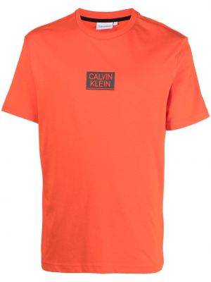 Памучна тениска Calvin Klein оранжево