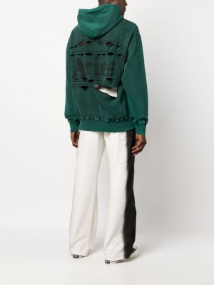 Kokvilnas apgrūtināti kapučdžemperis ar apdruku Aries zaļš