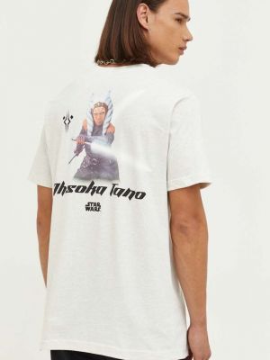 Bavlněné tričko s potiskem s hvězdami Dc béžové