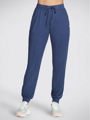 Priliehavé teplákové nohavice Skechers modrá