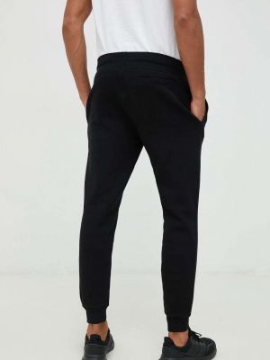 Melanžové sportovní kalhoty Guess černé