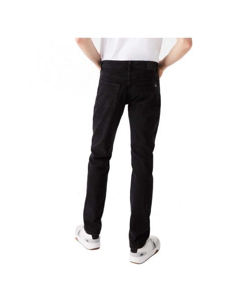Хлопковые джинсы скинни слим Lacoste черные