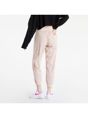 Pletené sportovní kalhoty Nike růžové