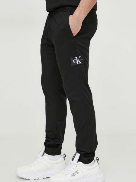 Spodnie dopasowane bawełniane Calvin Klein Jeans