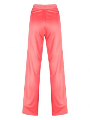 Spodnie sportowe w paski z nadrukiem The Upside różowe