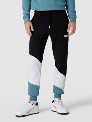 Spodnie sportowe z nadrukiem Puma Performance błękitne