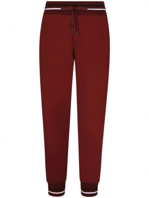Bavlnené teplákové nohavice s potlačou Dolce & Gabbana červená