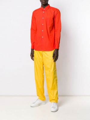 Sportovní kalhoty Comme Des Garçons Shirt žluté