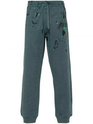 Pantaloni sport cu imagine Moschino verde