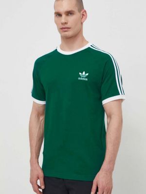 Смугаста бавовняна футболка з аплікацією Adidas Originals зелена
