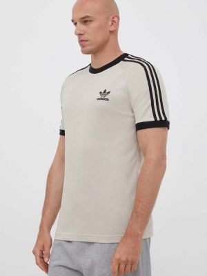 Памучна тениска с дълъг ръкав с апликация Adidas Originals бежово