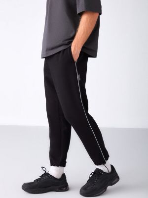 Pantaloni sport cu croială lejeră Grimelange negru
