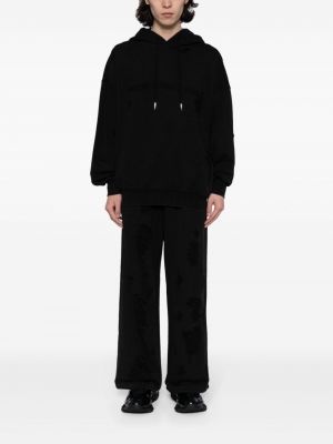 Sportovní kalhoty s dírami Feng Chen Wang černé