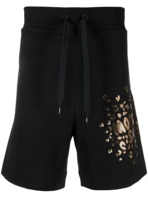 Bavlněné kalhoty Moschino černé