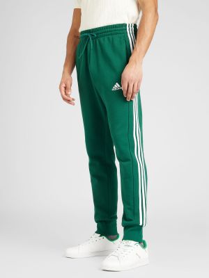 Priliehavé teplákové nohavice Adidas Sportswear