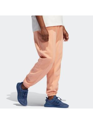 Спортивные брюки Adidas х Ivy Park оранжевый