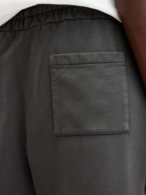 Bavlněné sportovní kalhoty s potiskem Allsaints šedé