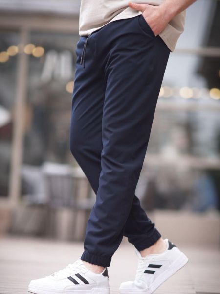 Běžecké kalhoty Madmext modré