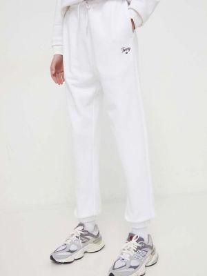 Spodnie sportowe bawełniane Tommy Jeans białe